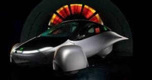 How did the first solar car prototype reflect the scientific curiosity of its time?